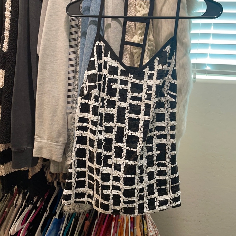 Woman’s black and white sequin top